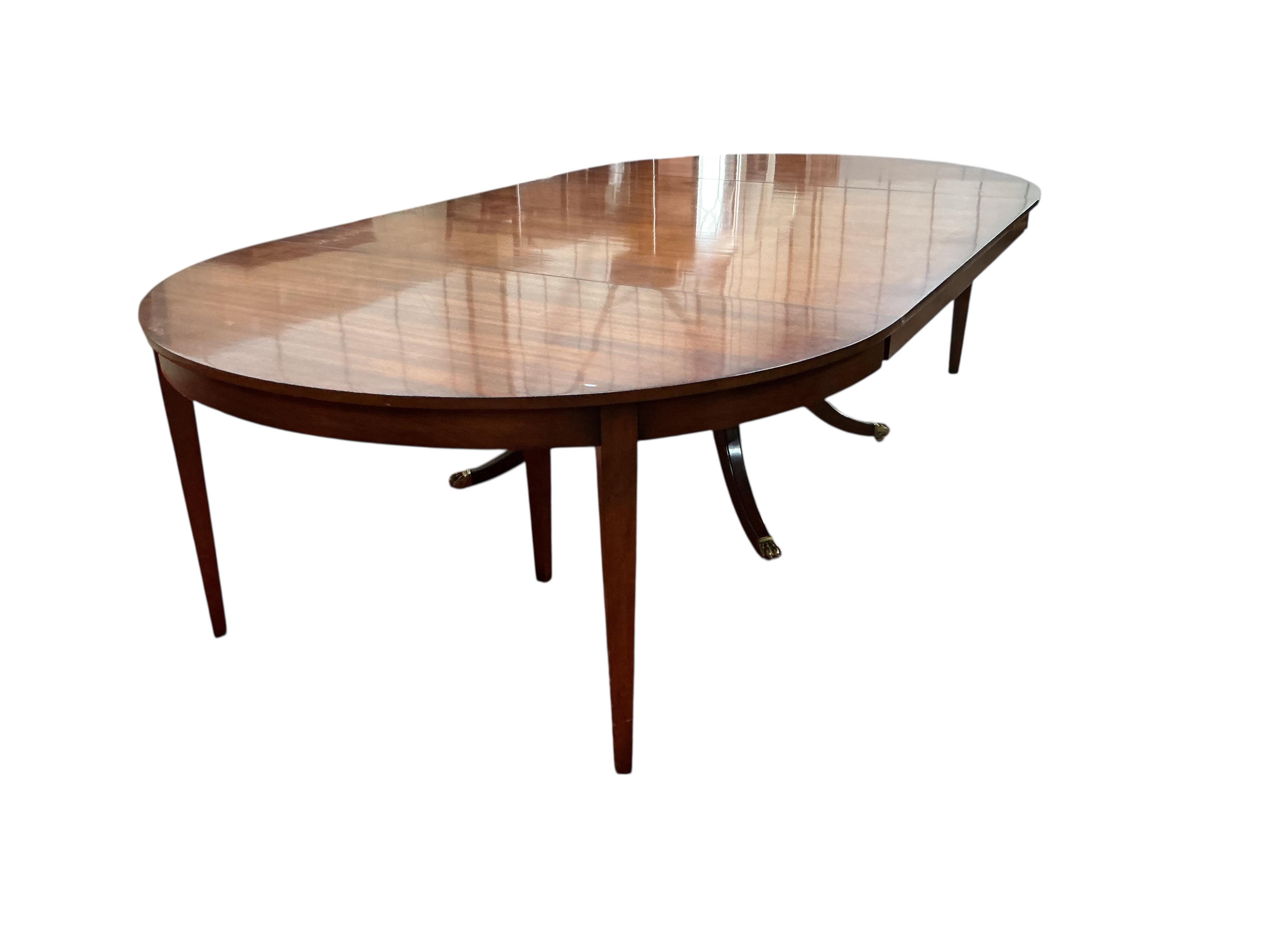 A reproduction George III style mahogany D end dining table, width 305cm extended, depth 145cm, height 74cm